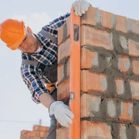 young-craftsman-building-house-scaled-1
